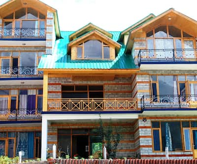 https://imgcld.yatra.com/ytimages/image/upload/t_hotel_yatra_city_desktop/v1432550190/Domestic Hotels/Hotels_Manali/7 Hills Resort/overview.jpg